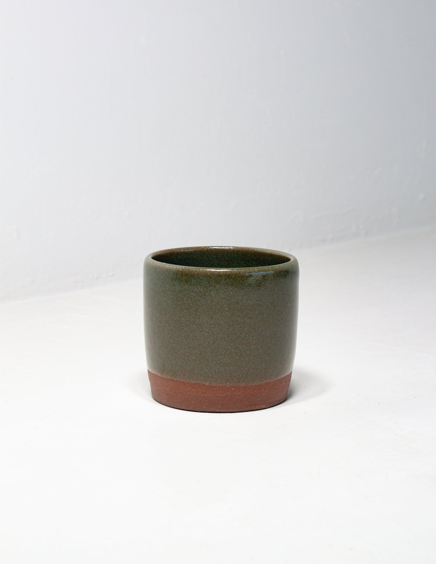 Handmade salt cellar in a green glaze handcrafted by artisans at Black Oak Art