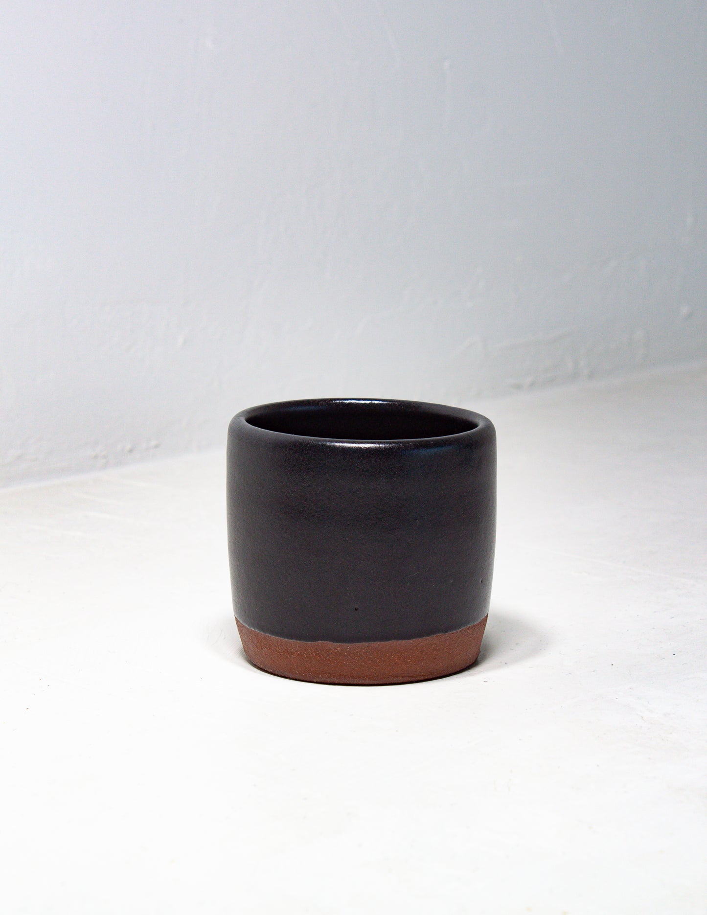 Handmade salt cellar in a black glaze handcrafted by artisans at Black Oak Art