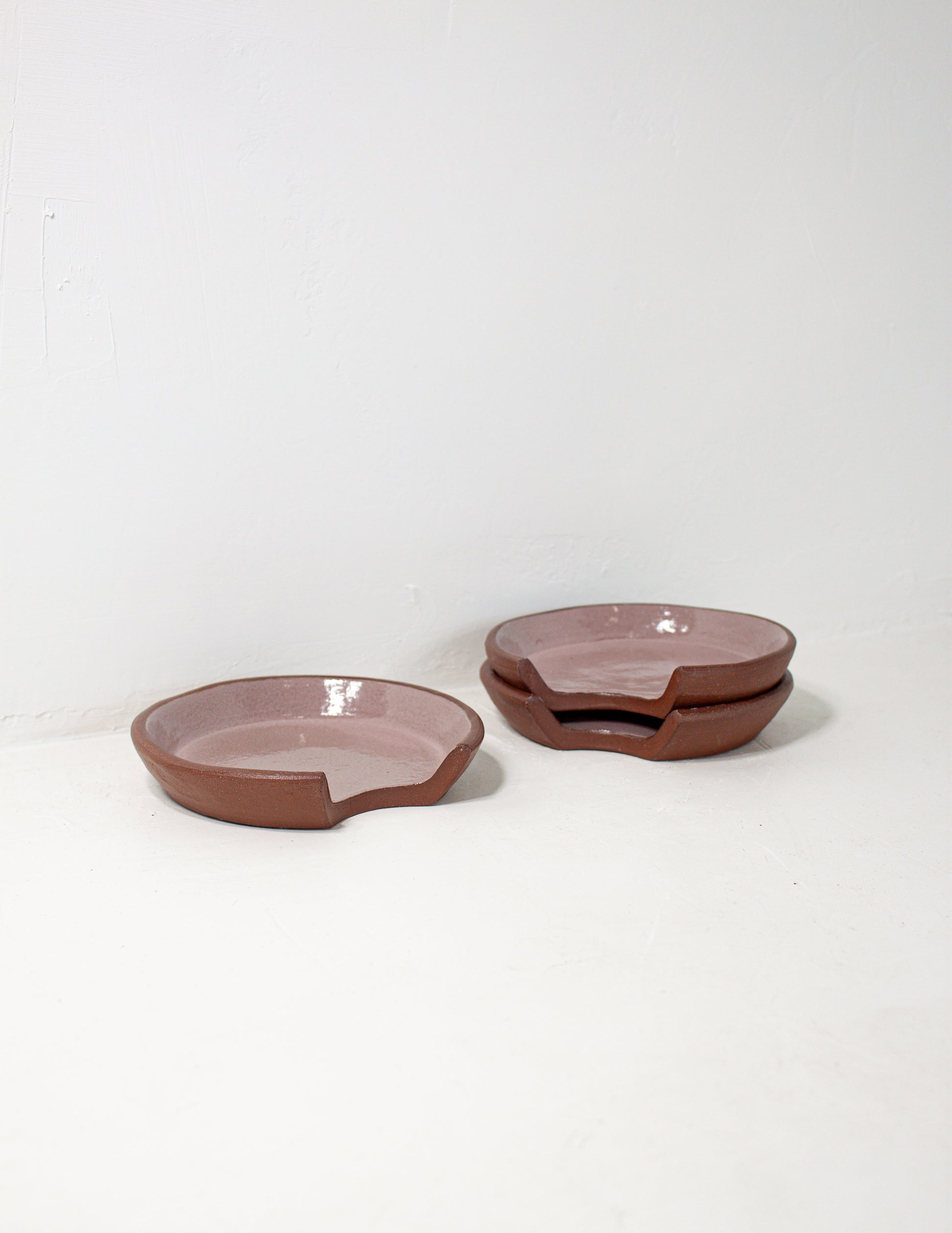 handthrown spoon rest glazed in pink