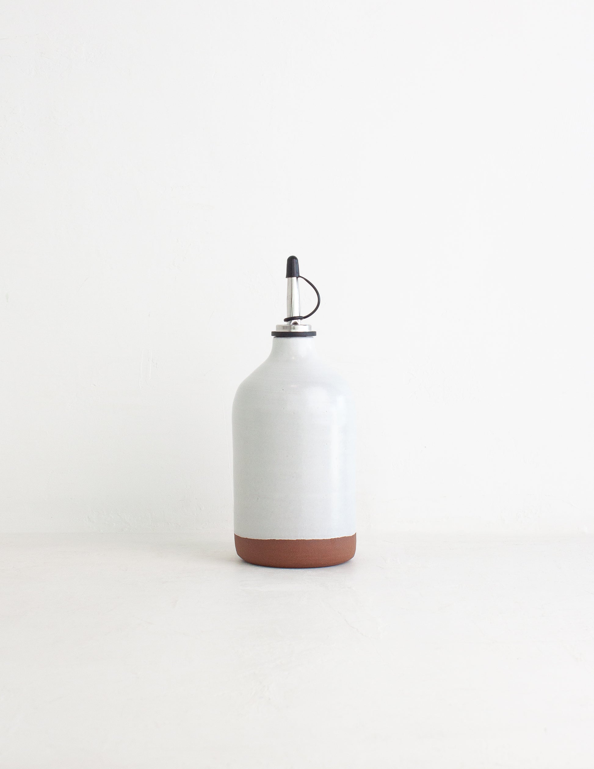 White handmade oil cruet