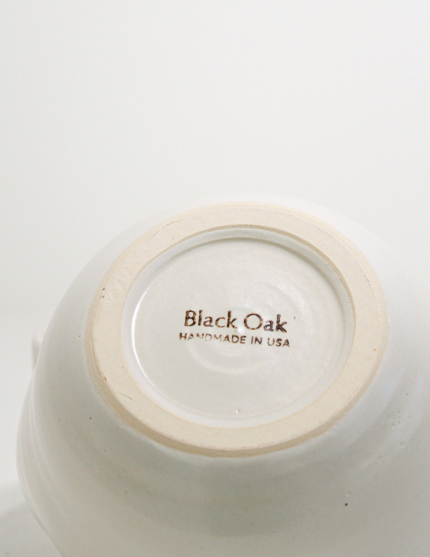 Handmade ceramic ramen bowl featuring a folded lip for a convenient utensil holder. These Handmade bowls are made by Black Oak Art in Waco, Texas.