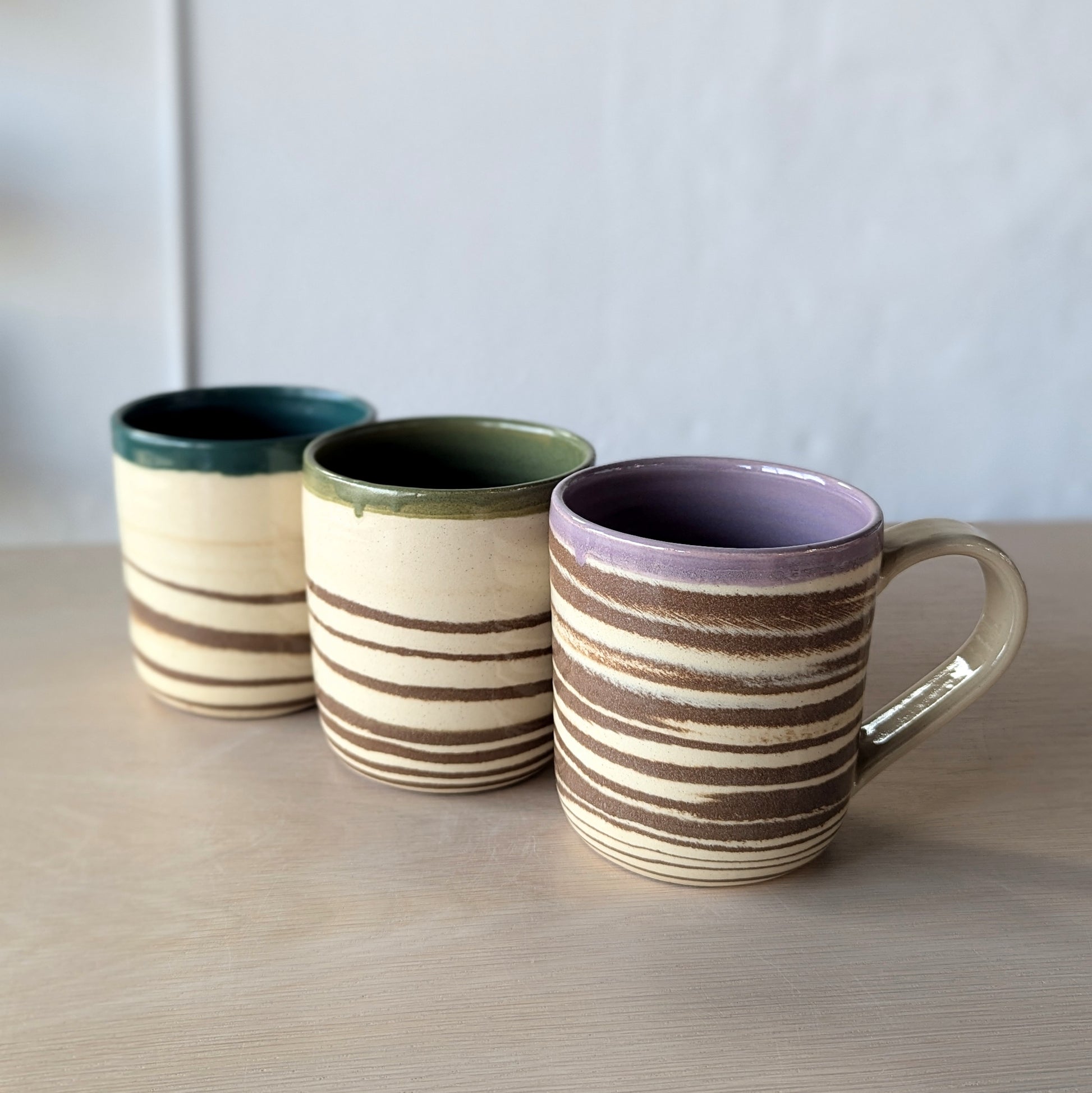 marbled hand thrown handmade mugs green purple teal