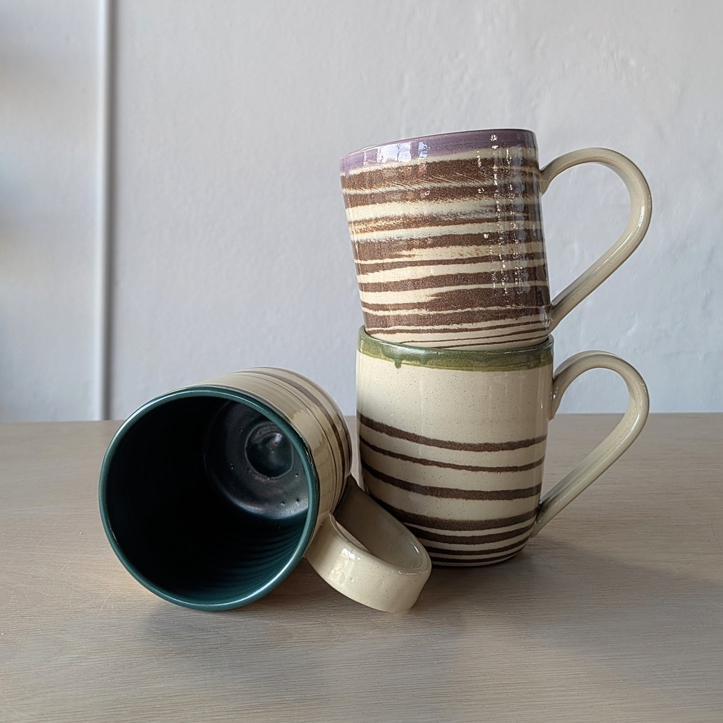 marbled hand thrown handmade mugs green purple teal