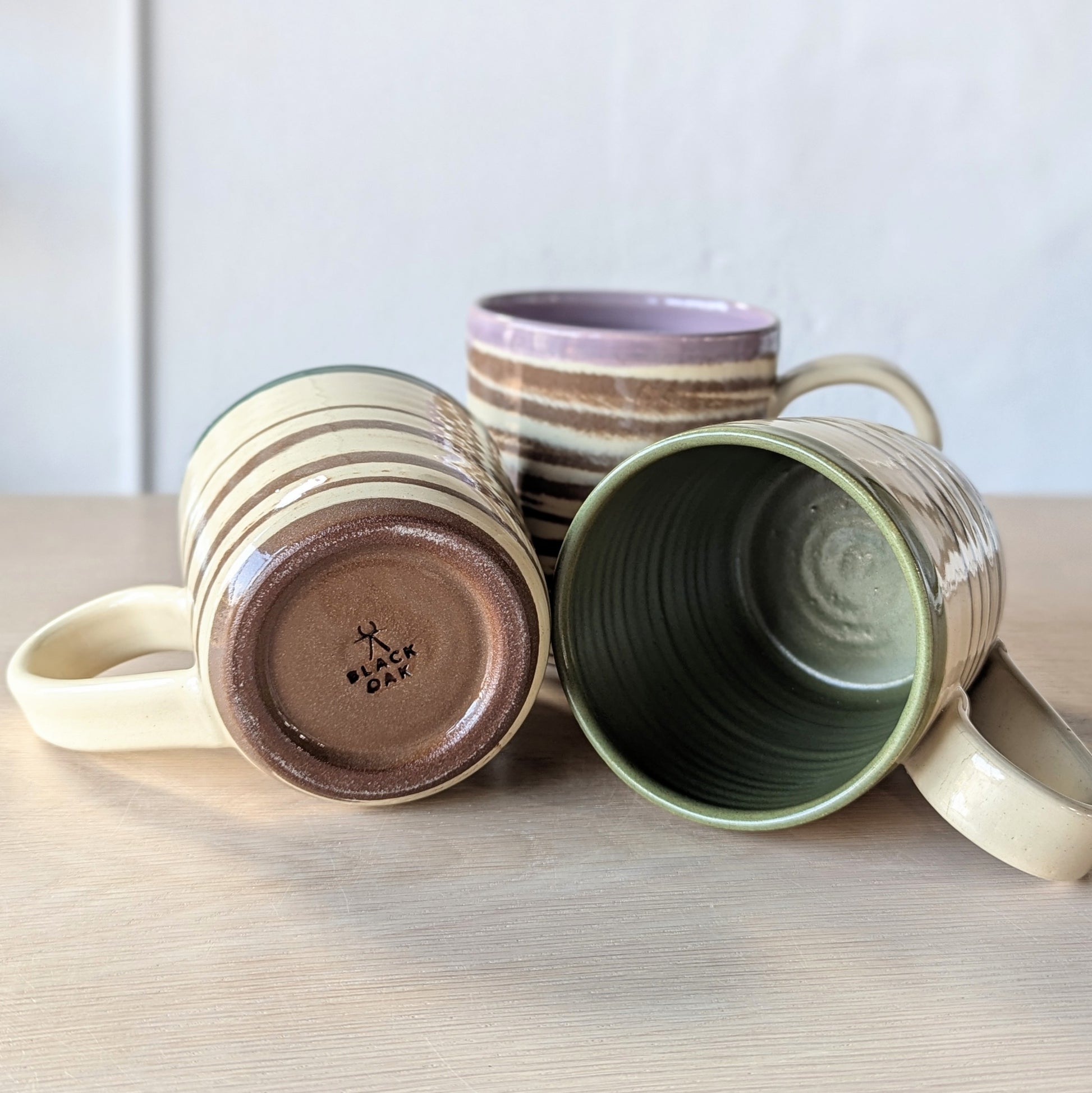 marbled hand thrown handmade mugs green purple teal