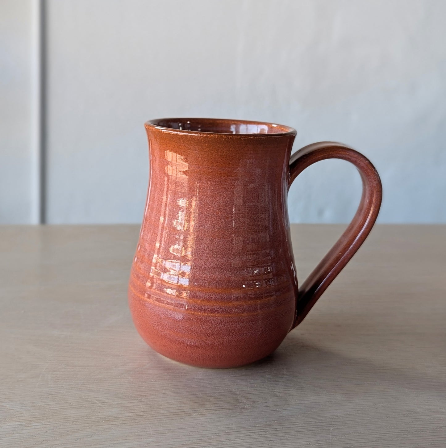 tall potbelly hand thrown handmade mug orange