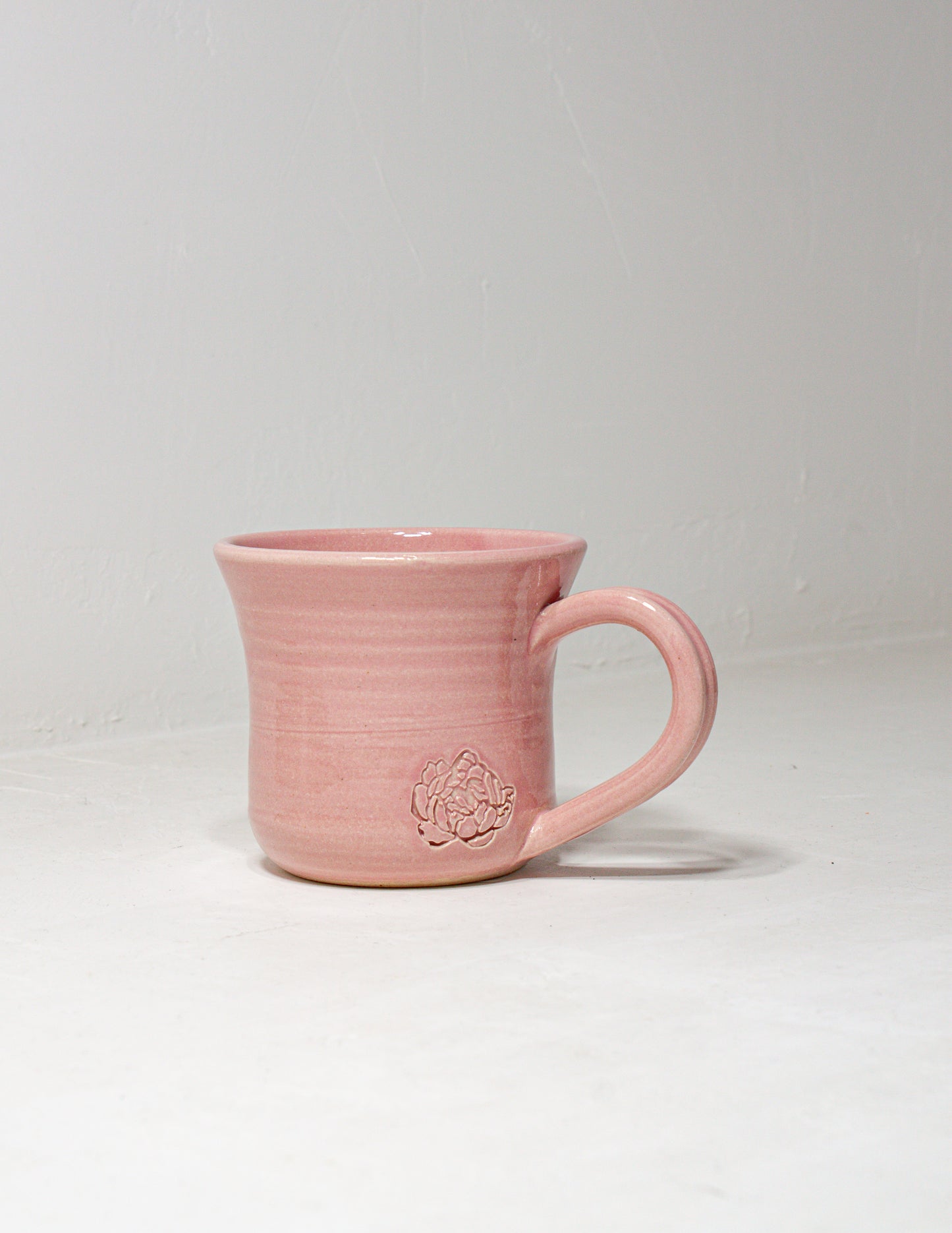 handmade tea cup featuring an indented peony that is perfect for your afternoon tea