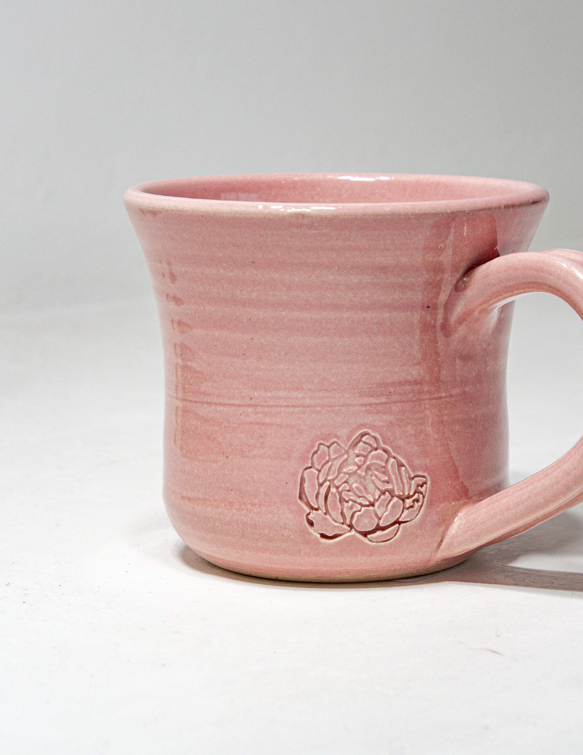 handmade tea cup featuring an indented peony that is perfect for your afternoon tea