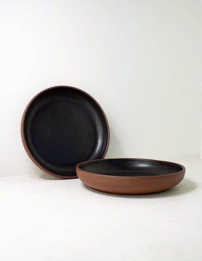 bespoke serving platters in a black glaze