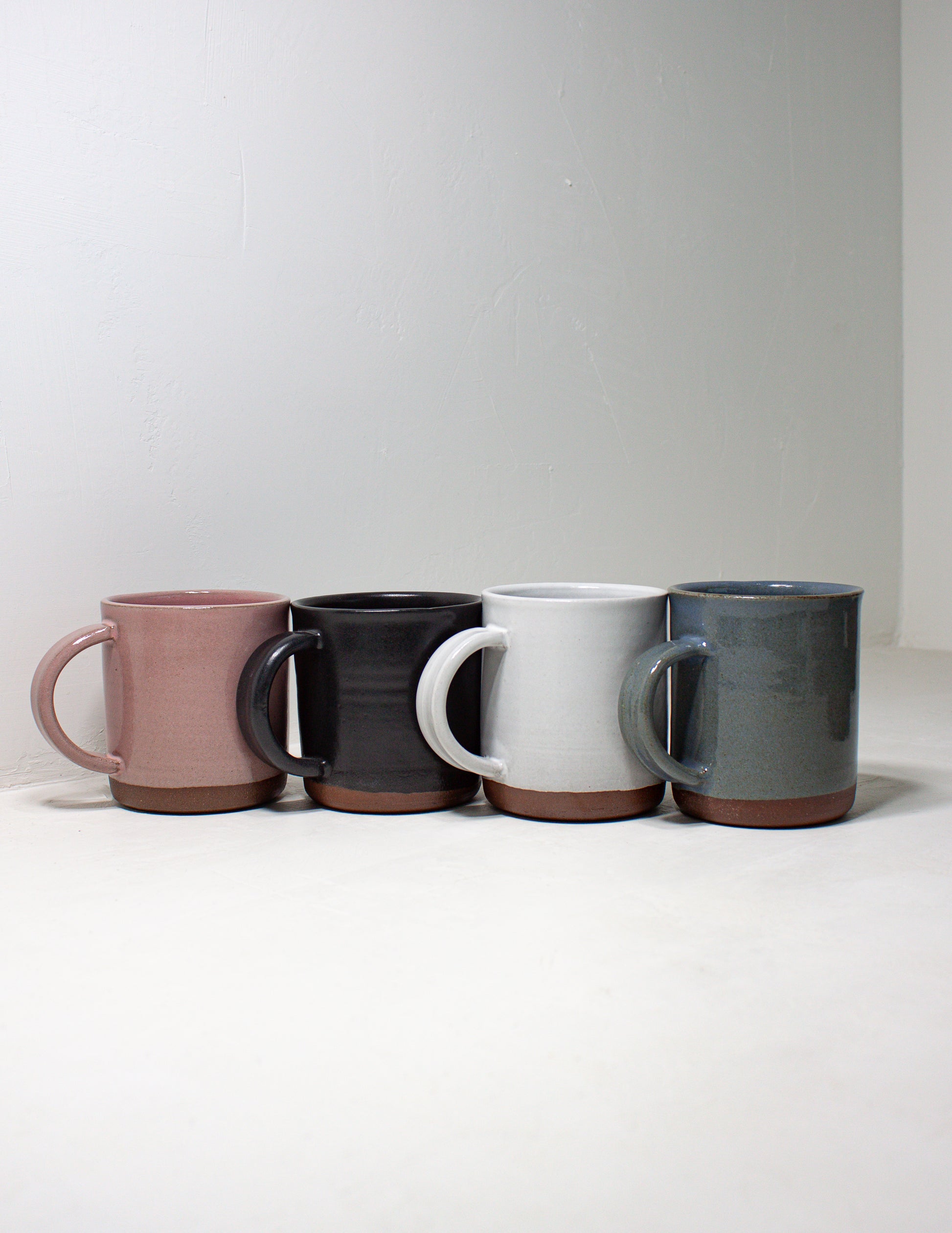 Group of handmade coffee mugs