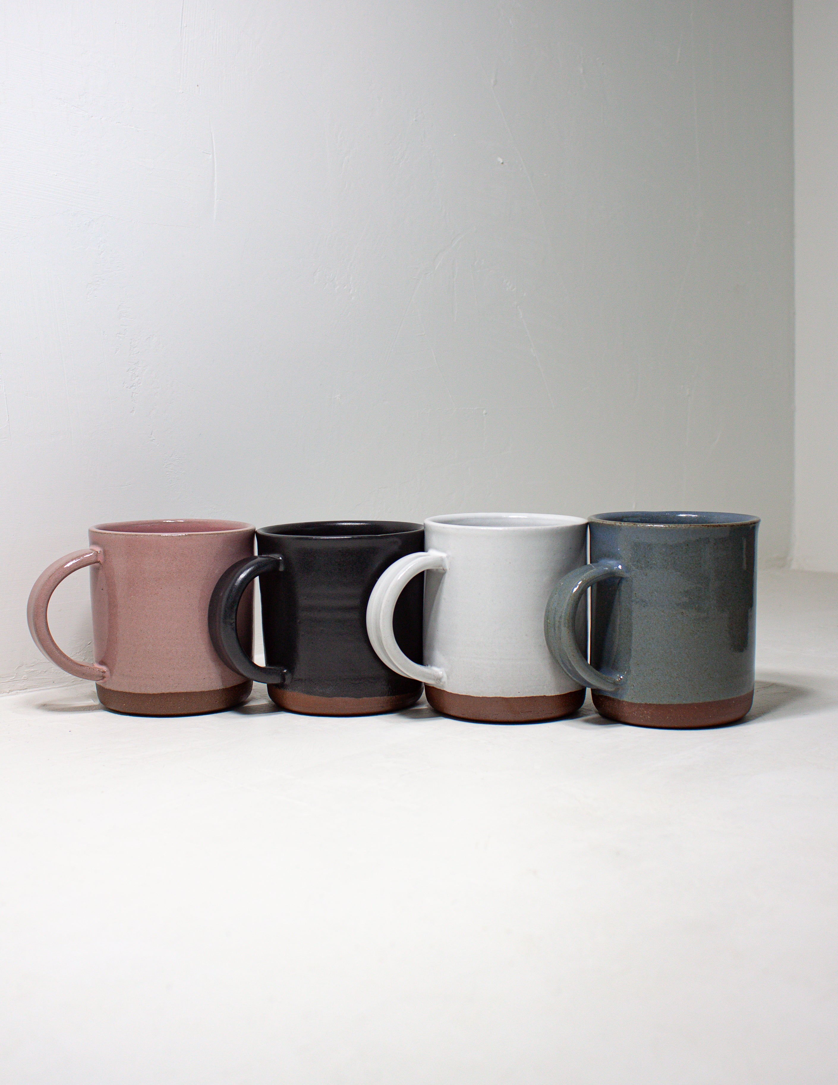 Group of handmade coffee mugs