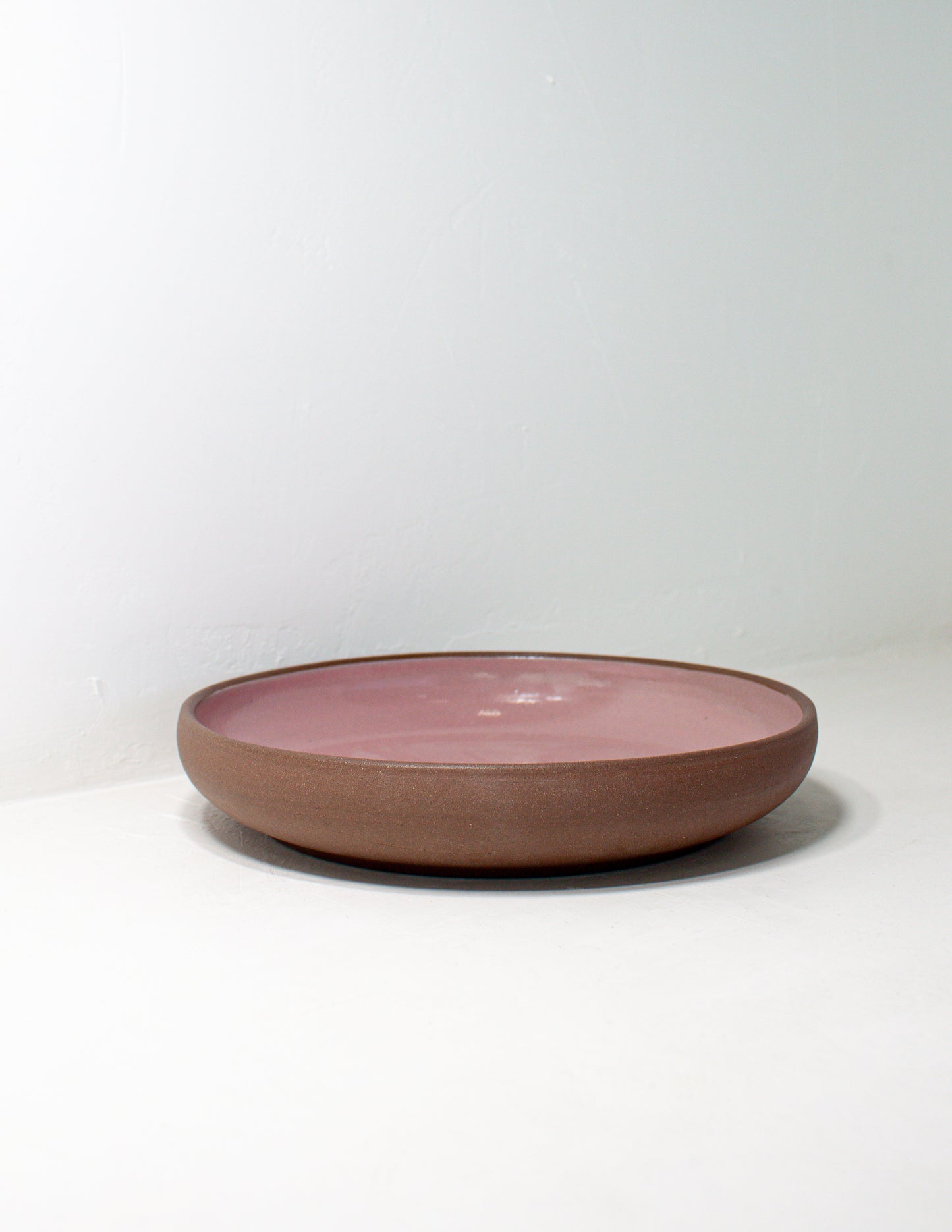 handmade ceramic serving bowl glazed in pink