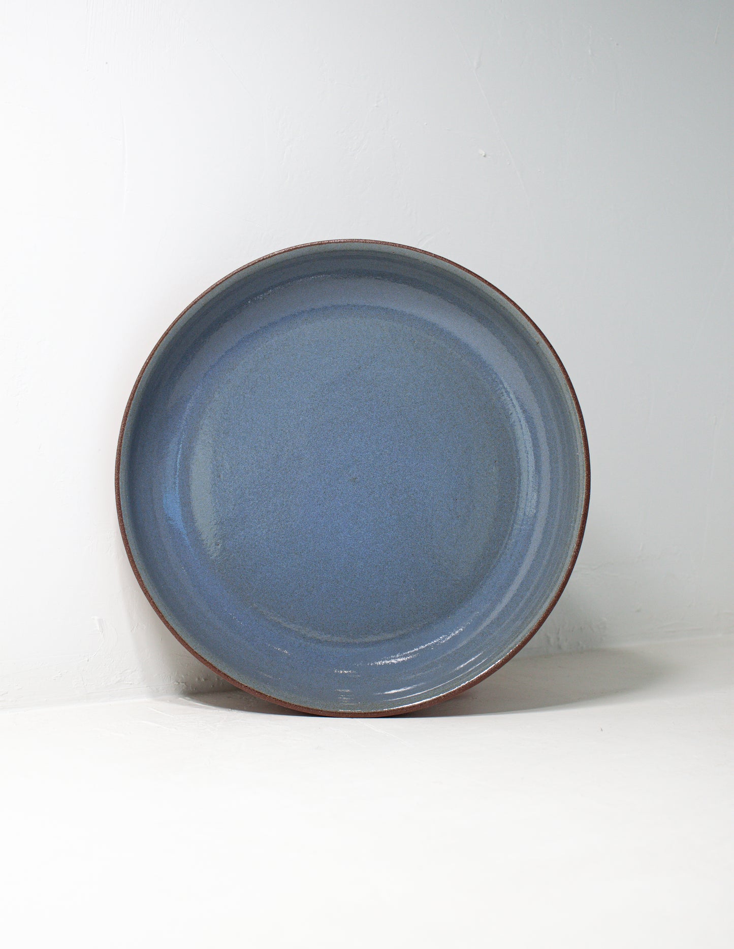 Handmade serving dish in blue glaze