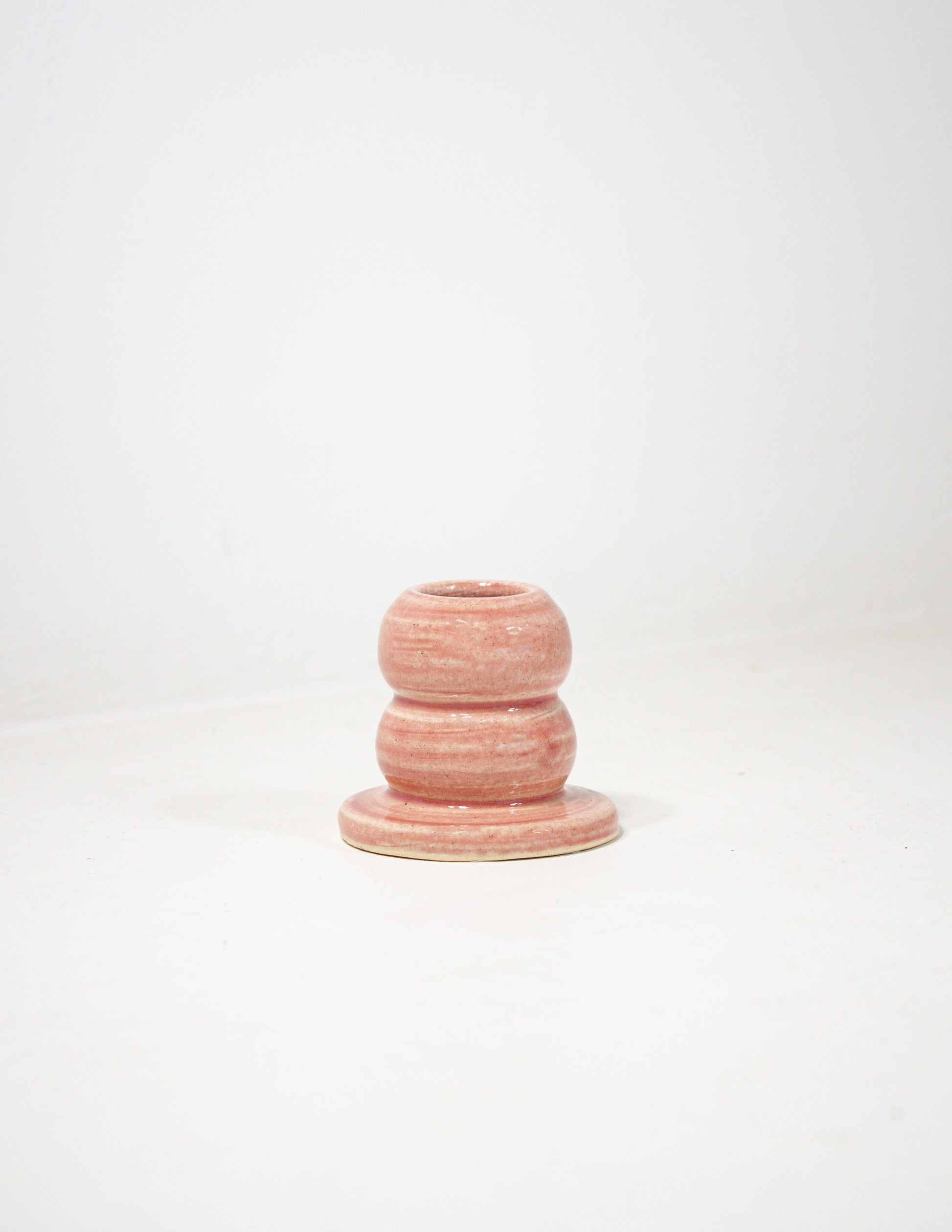 Short bubble candle stick holder in pink glaze