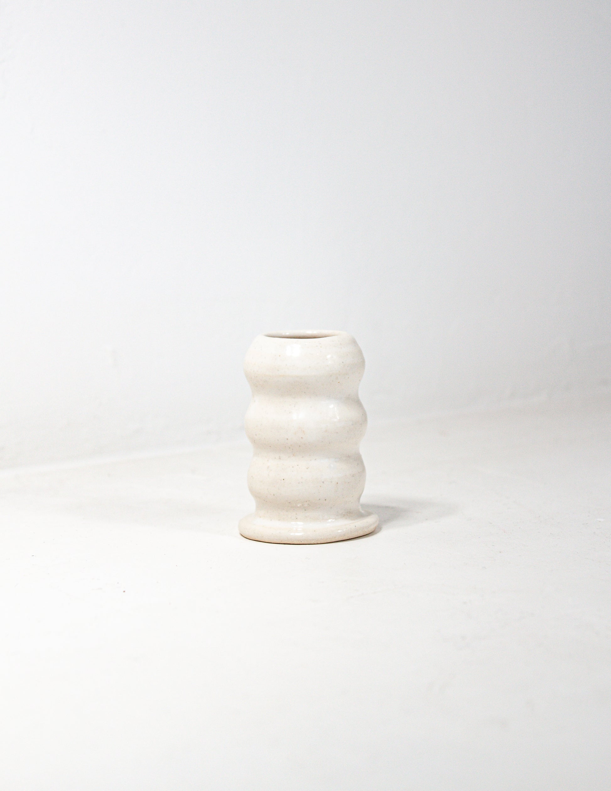 Handmade bubble candle stick holder in white glaze