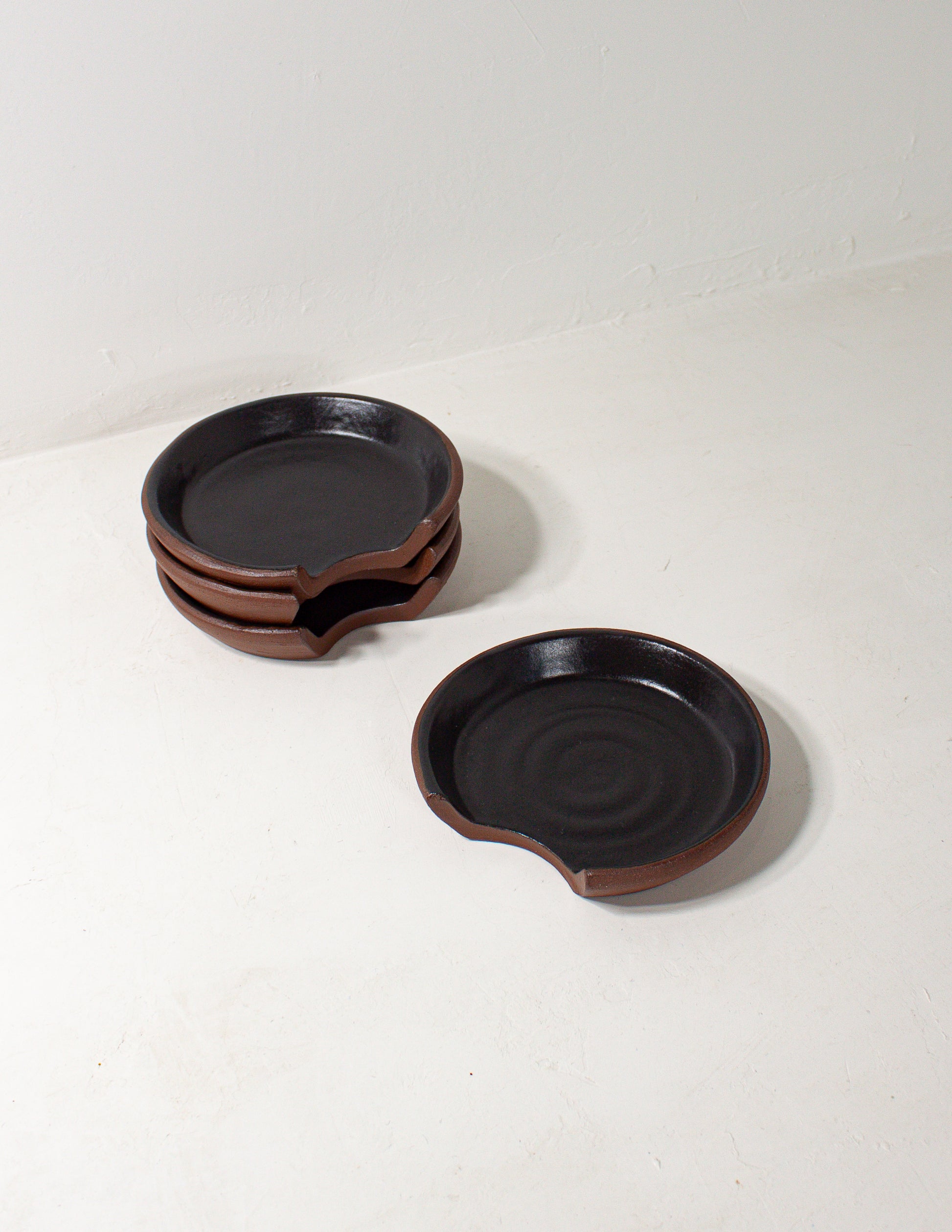handmade ceramic spoon rest in black glaze
