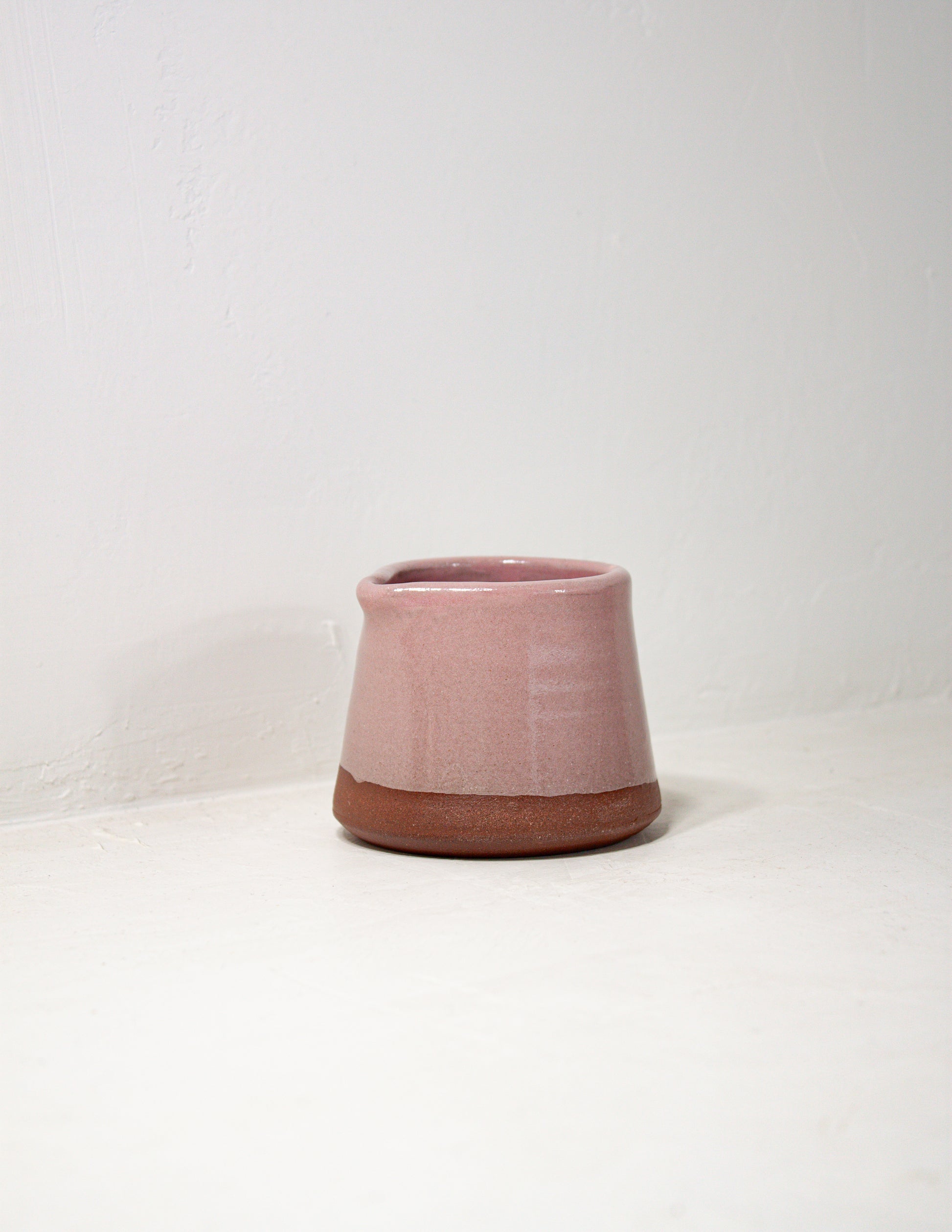 small pink pitcher designed for creamer