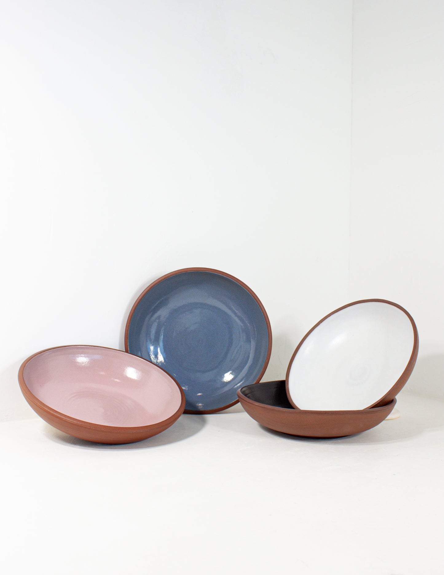 A group of handmade dinner bowls