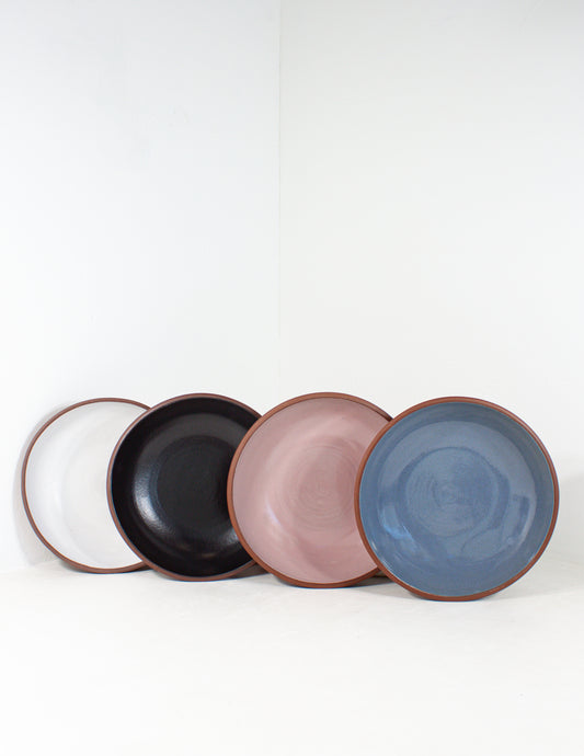 A group of handmade pasta bowls designed for professional chefs