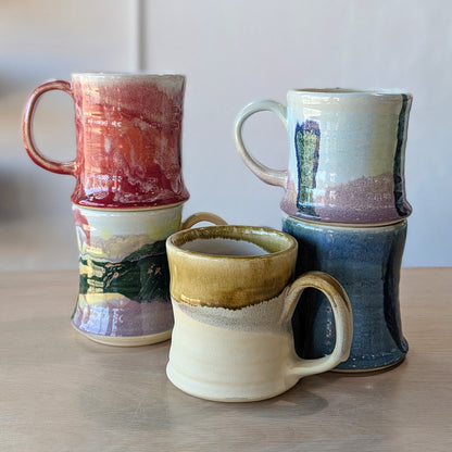 five handmade hand painted ceramic mugs red rainbow gold sand blue