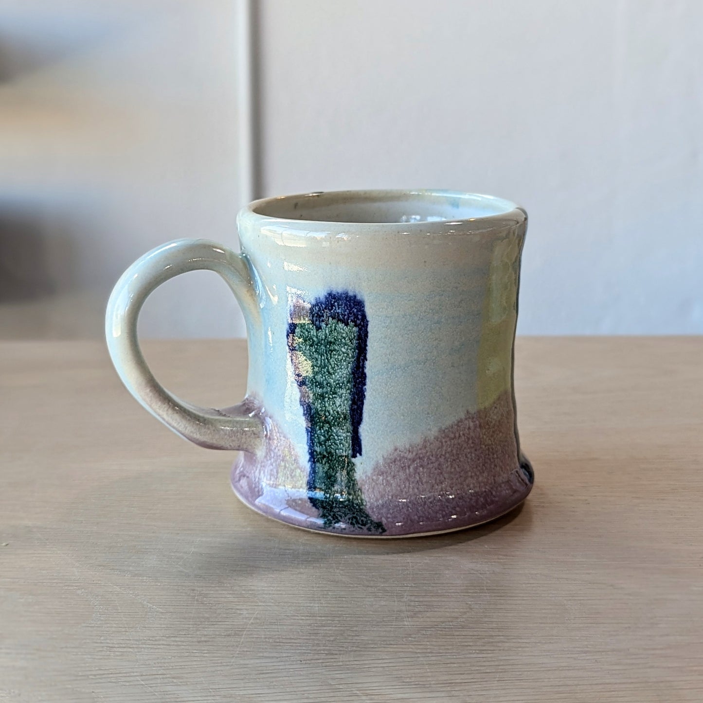 handmade hand thrown ceramic mug light blue, green, lilac purple