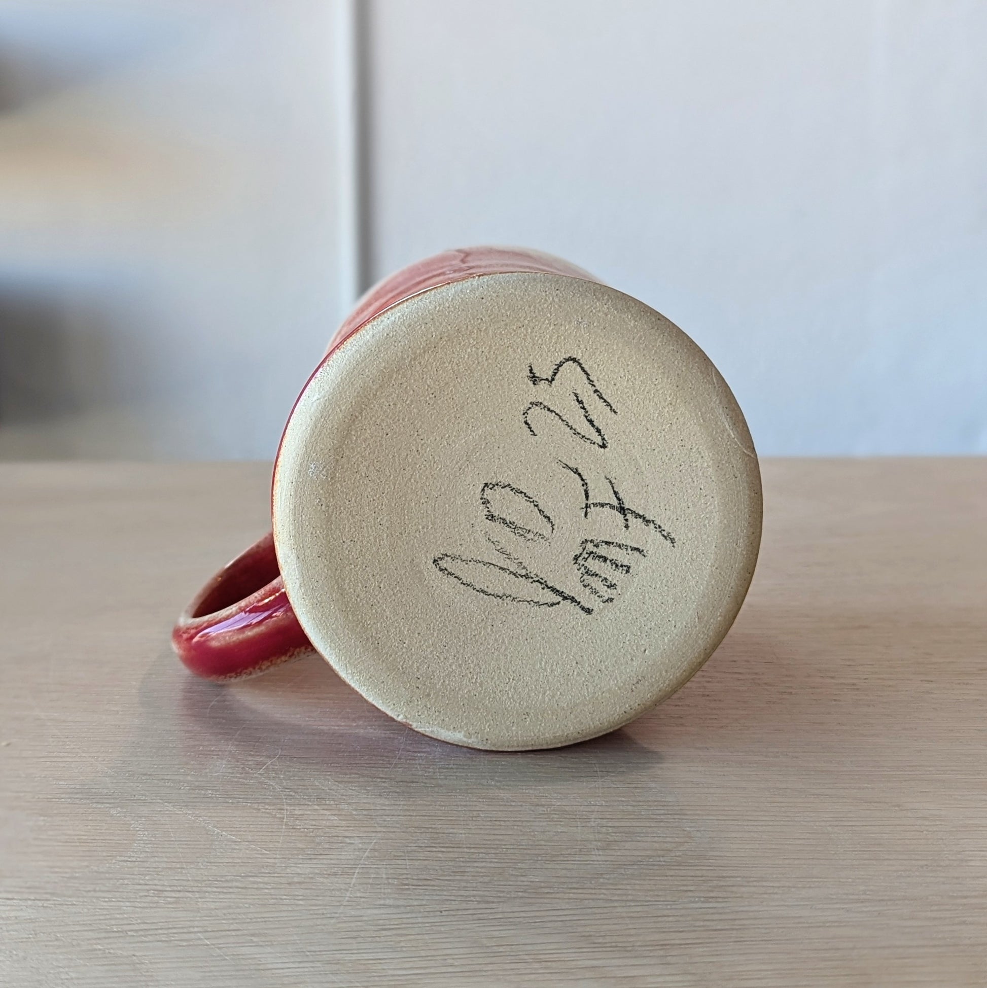 handmade hand thrown ceramic mug bottom signature