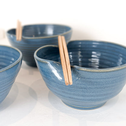 Handmade ceramic ramen bowl featuring a folded lip for a convenient utensil holder. These Handmade bowls are made by Black Oak Art in Waco, Texas.