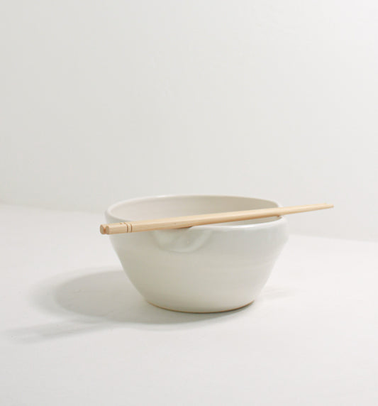 Handmade ceramic ramen bowl featuring a folded lip for a convenient utensil holder. These Handmade bowls are made by Black Oak Art in Waco, Texas.