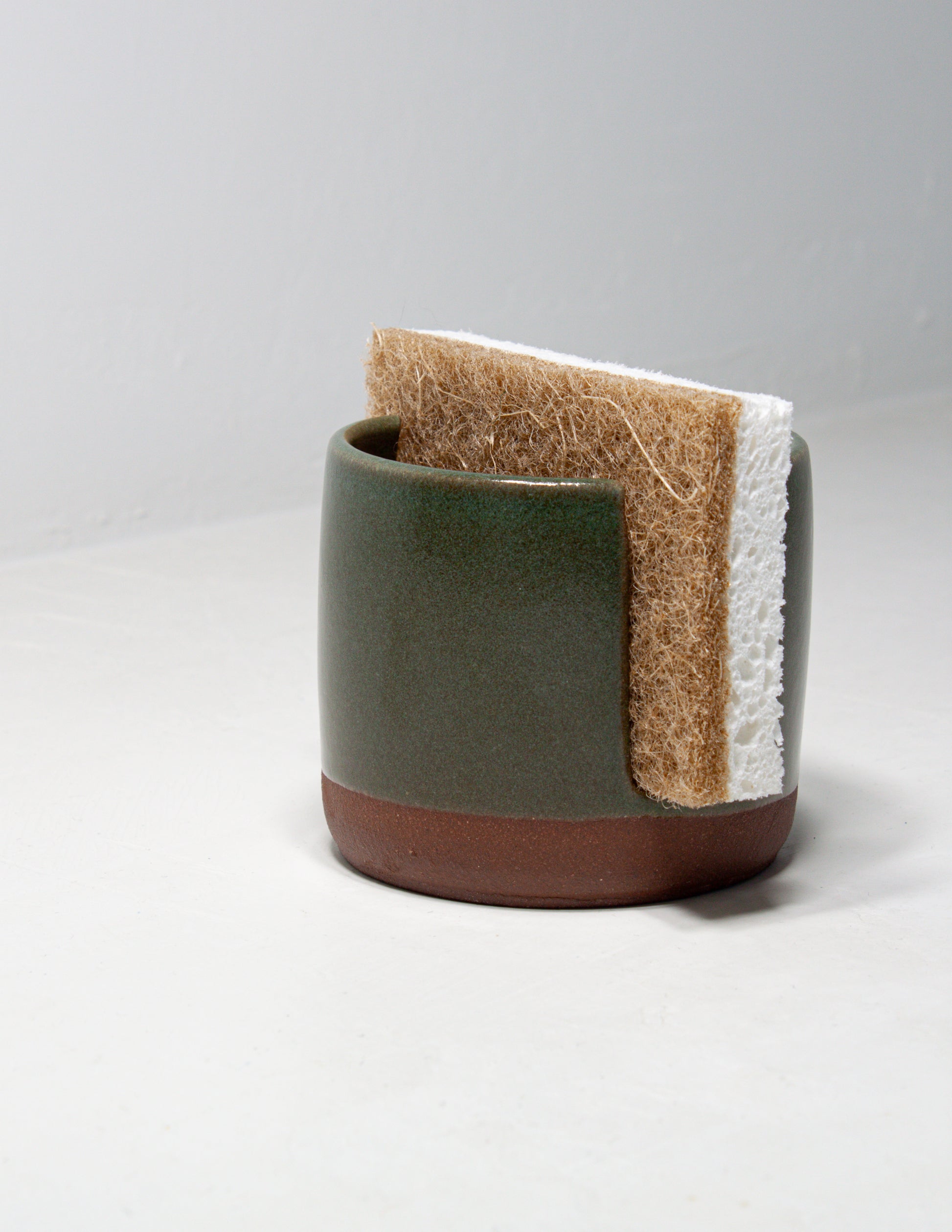 Moss green handmade ceramic sponge holder crafted by skilled artisans at Black Oak Art