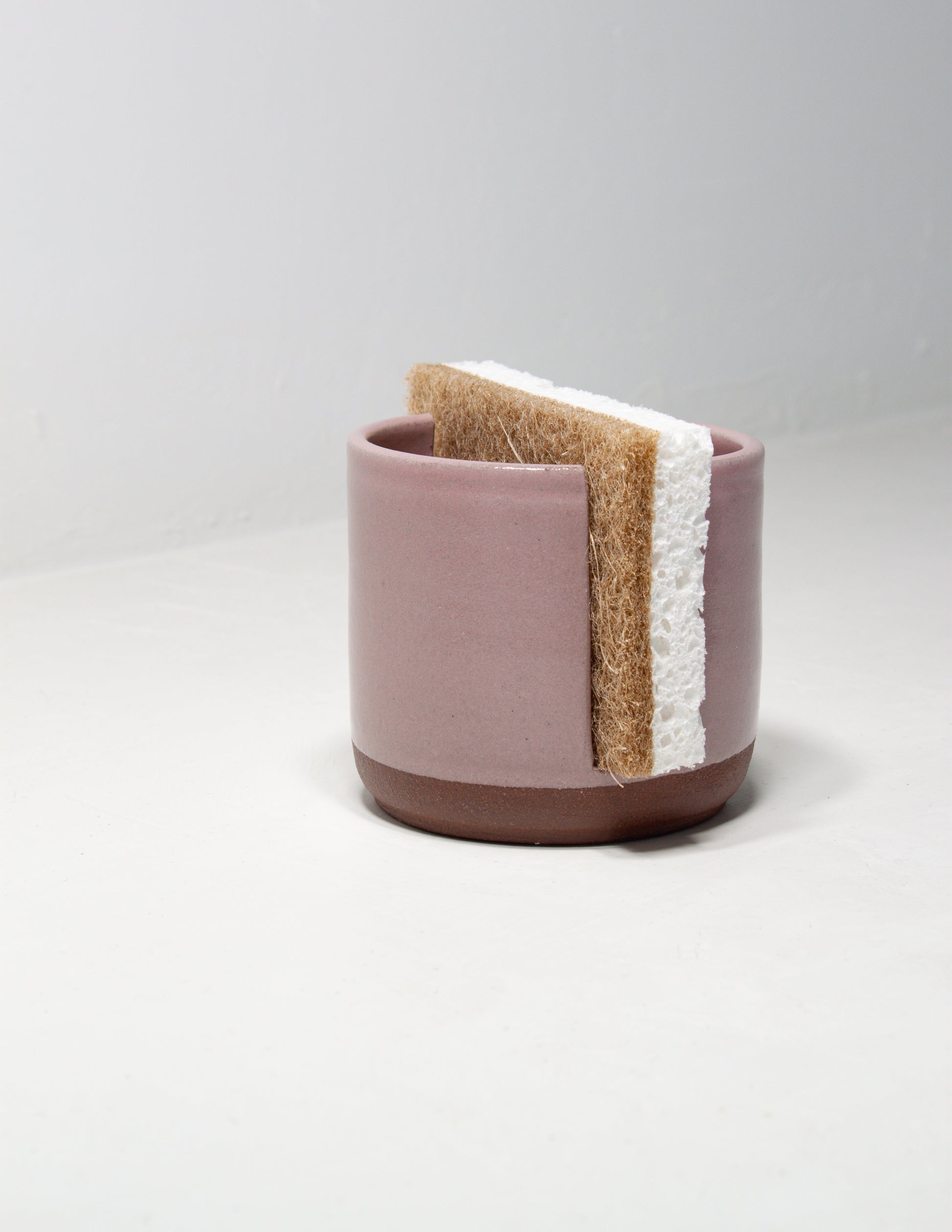 Pink handmade ceramic sponge holder crafted by skilled artisans at Black Oak Art