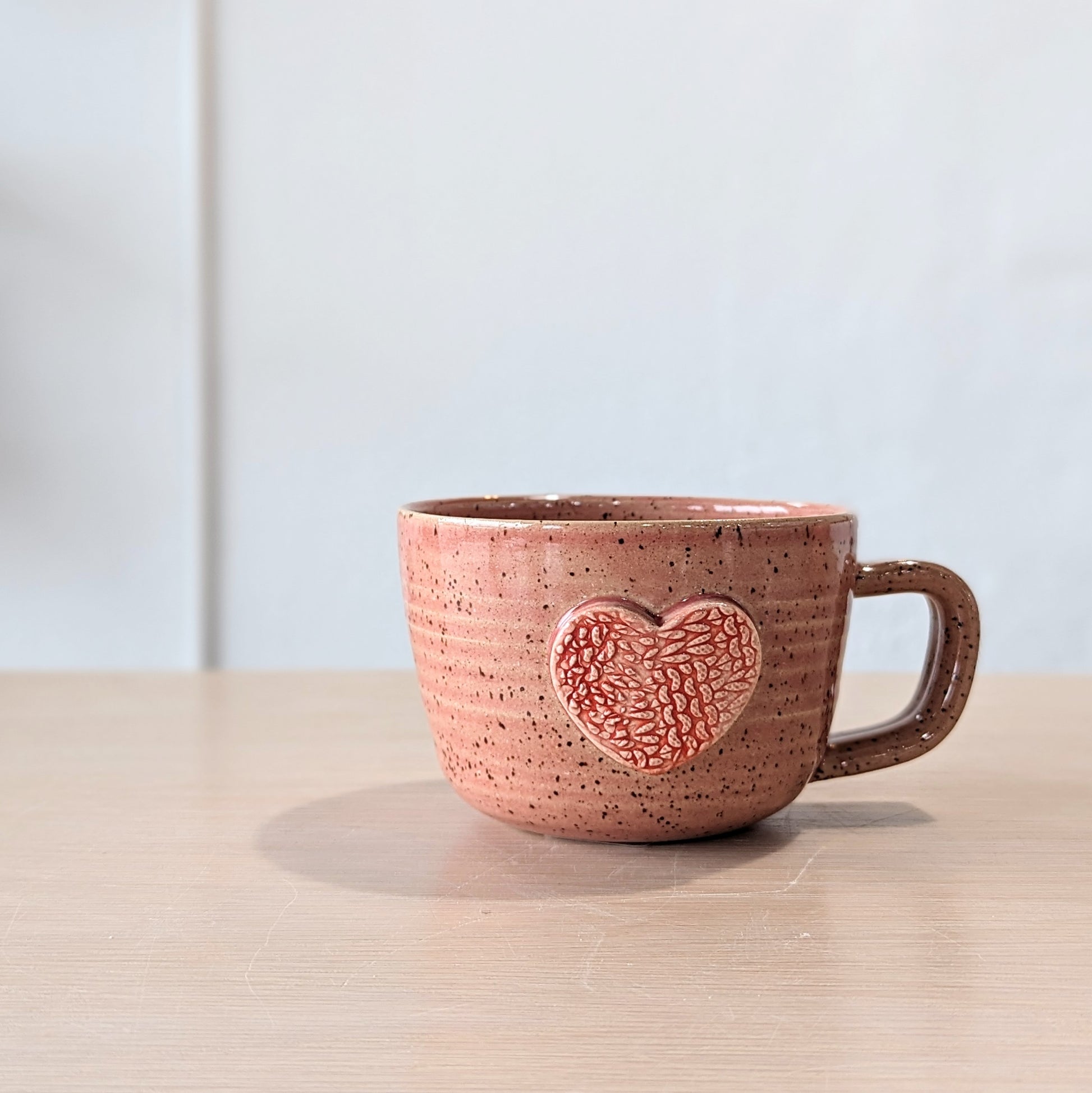 Hand-thrown sweater heart mug
