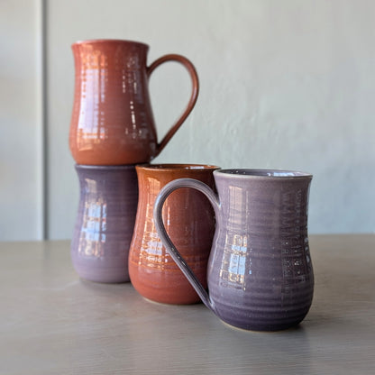 tall potbelly hand thrown handmade mugs orange and purple