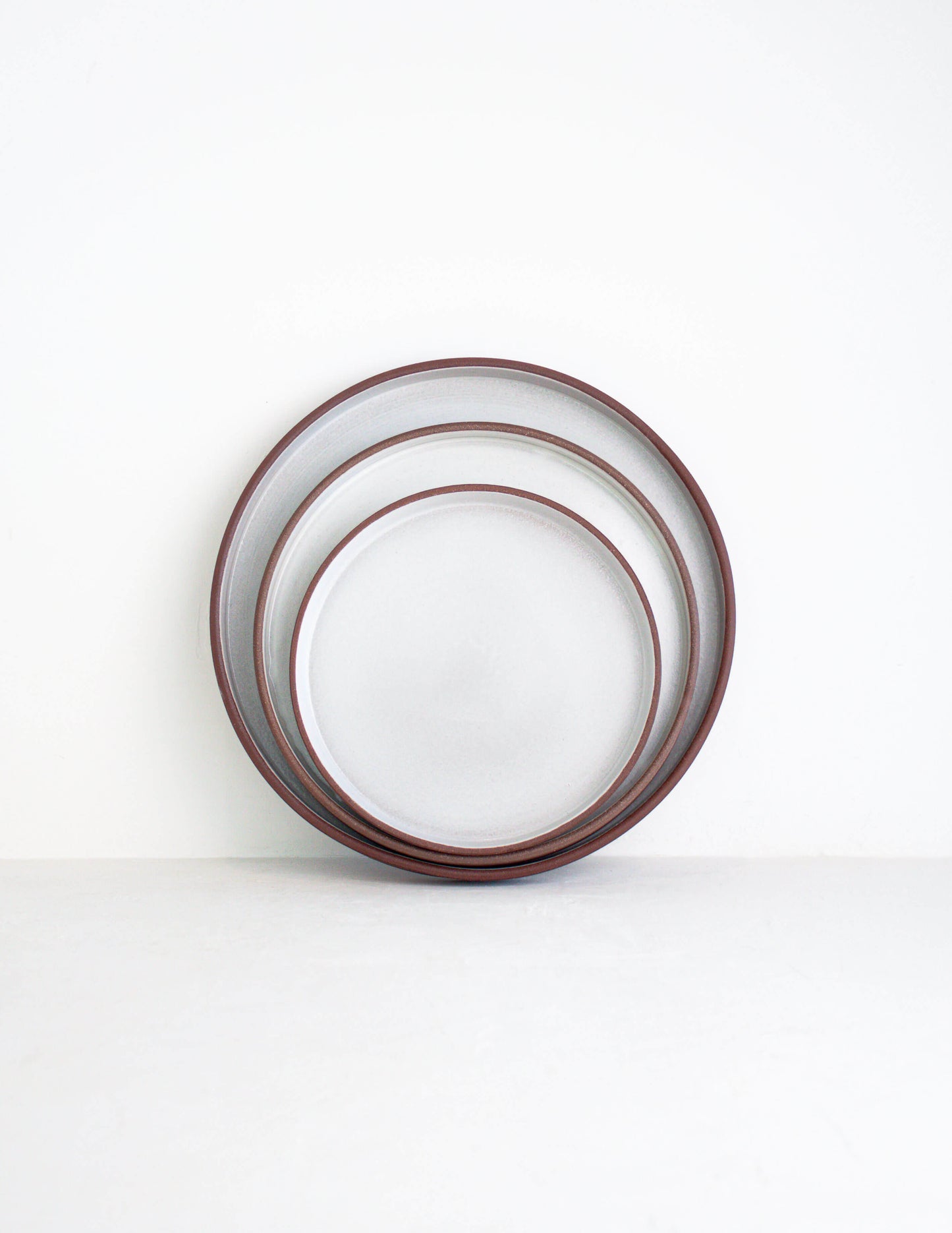 Refined dark clay straight sided dinner plate near me in Waco, TX