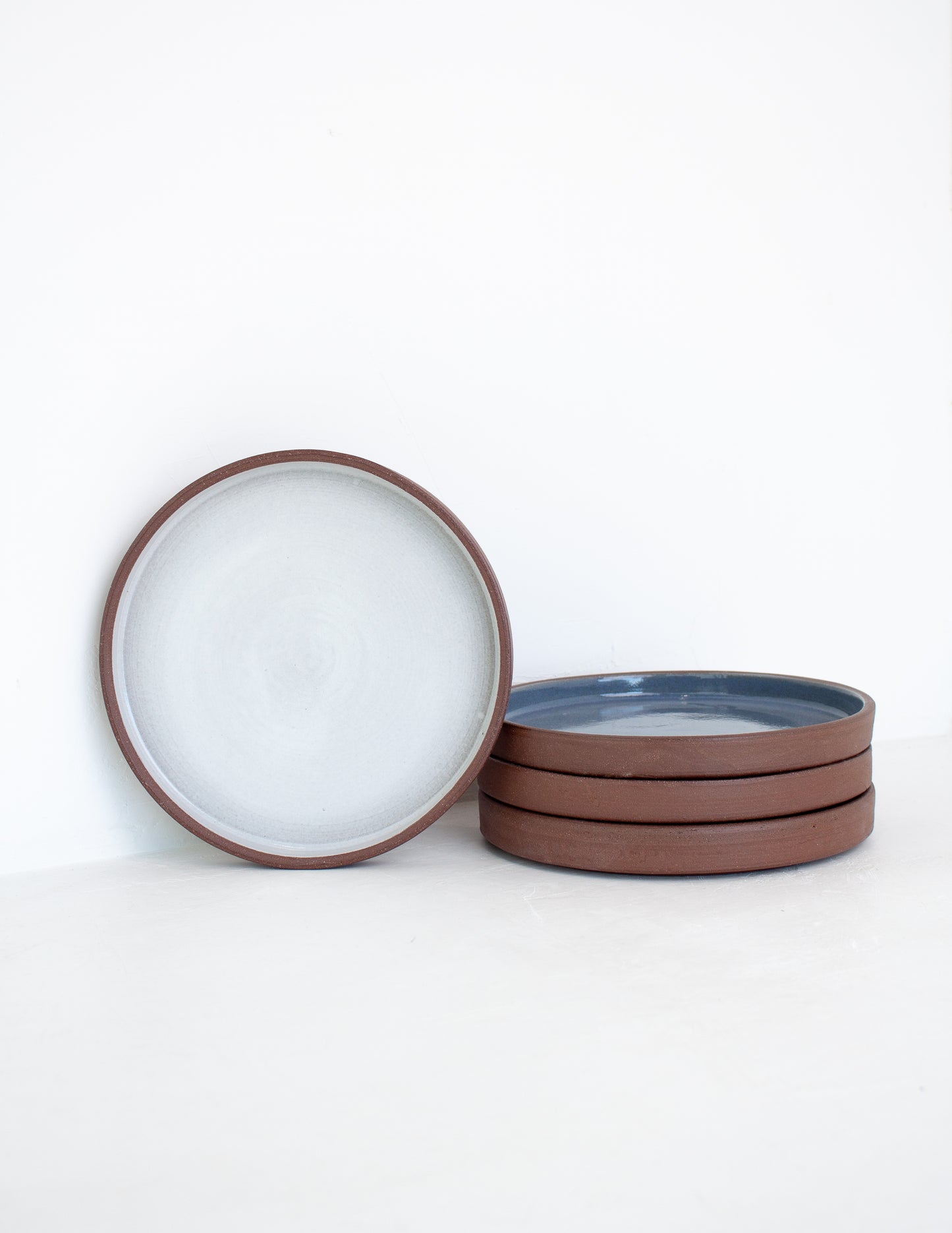 Stackable straight-sided plates handmade by Black Oak Art